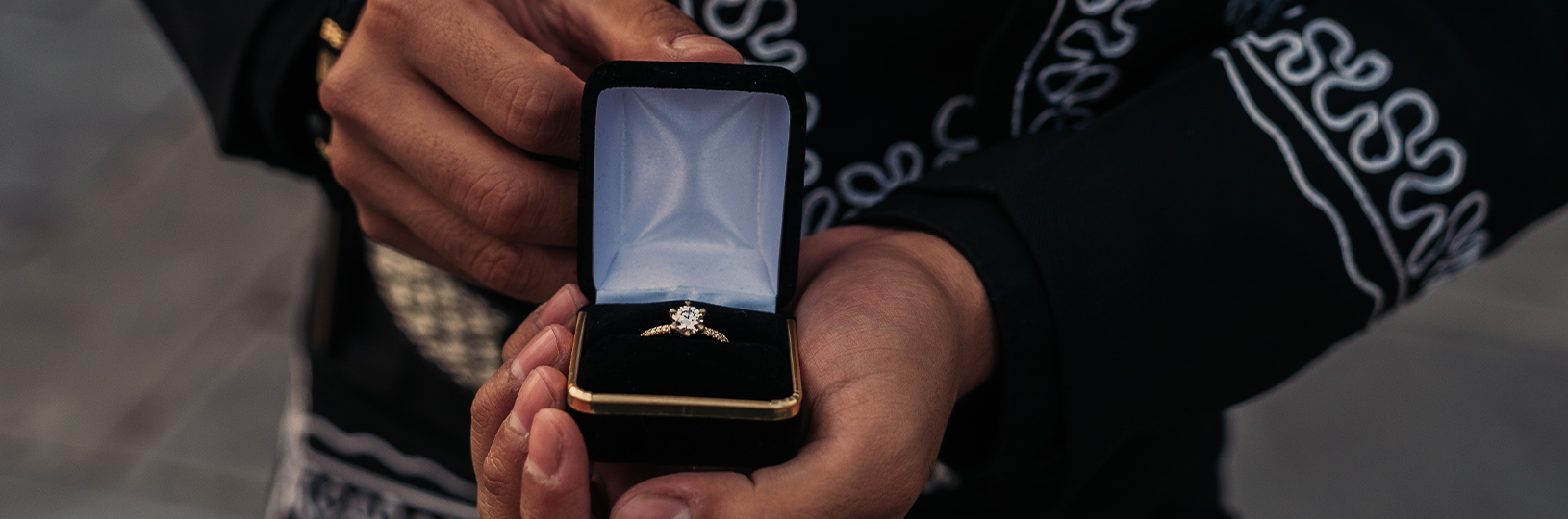 Proposal with a simulated diamond engagement ring