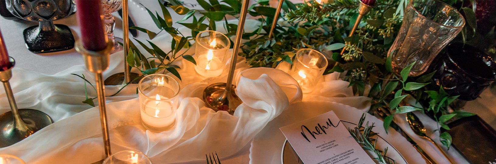 Wedding table centerpiece with name tag and candles