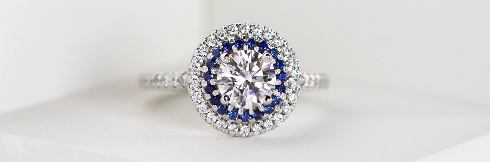 Halo sapphire engagement ring