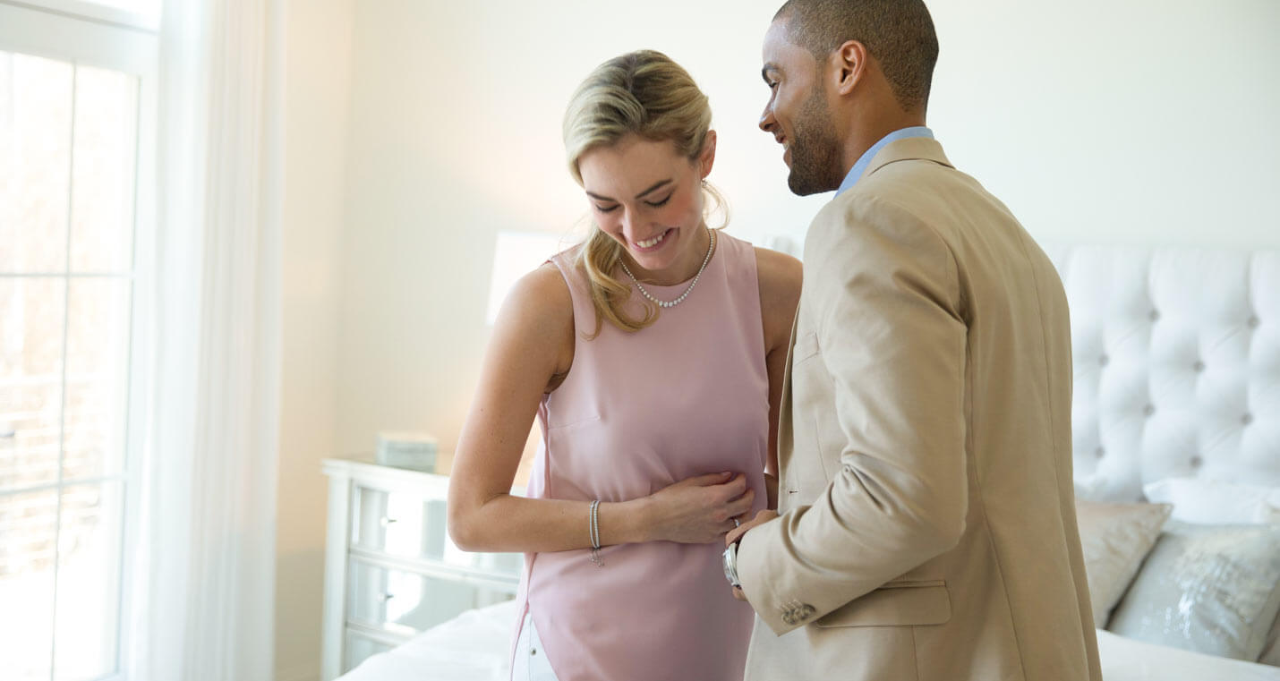 a woman and a man laughing