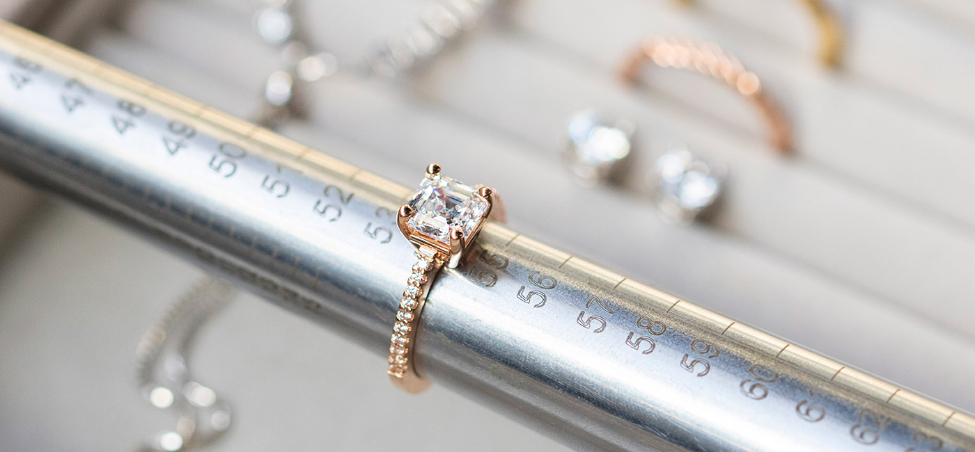 a Diamond Nexus engagement ring being measured on a mandrel