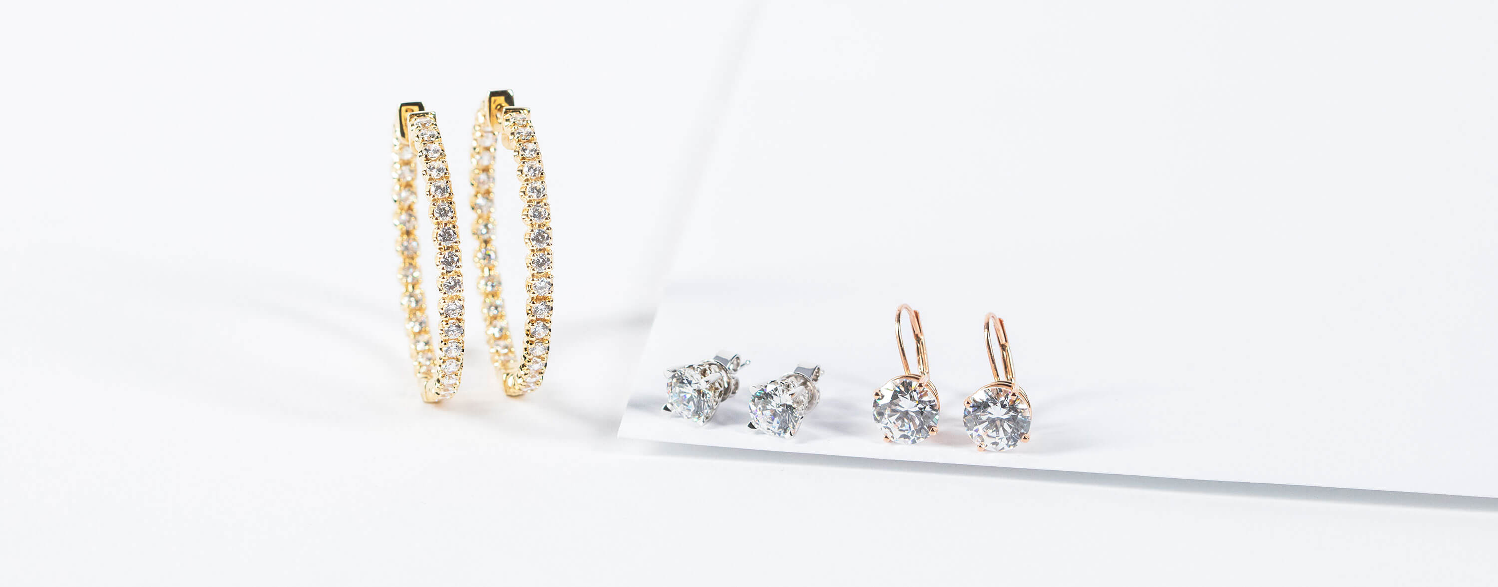 Assorted Diamond Nexus earrings in white, yellow and rose gold