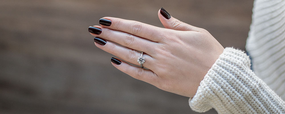 woman's hand with a ring on