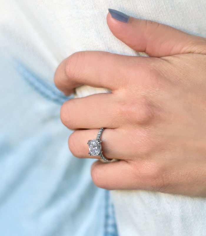 woman's hand with a ring on