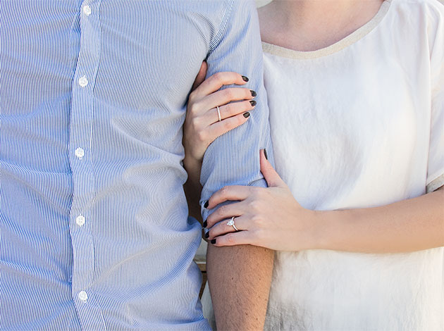 man and woman holding hands