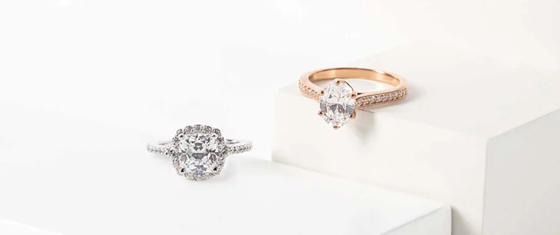 two engagement rings side by side