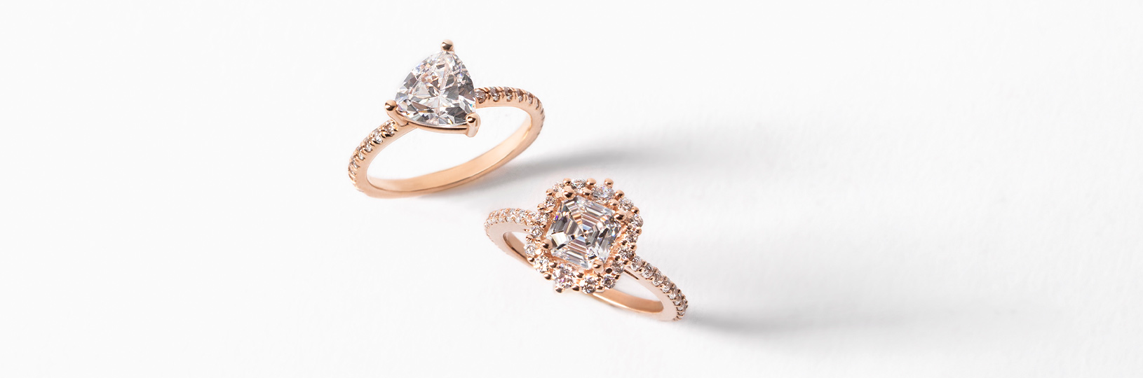 two rose gold engagement rings