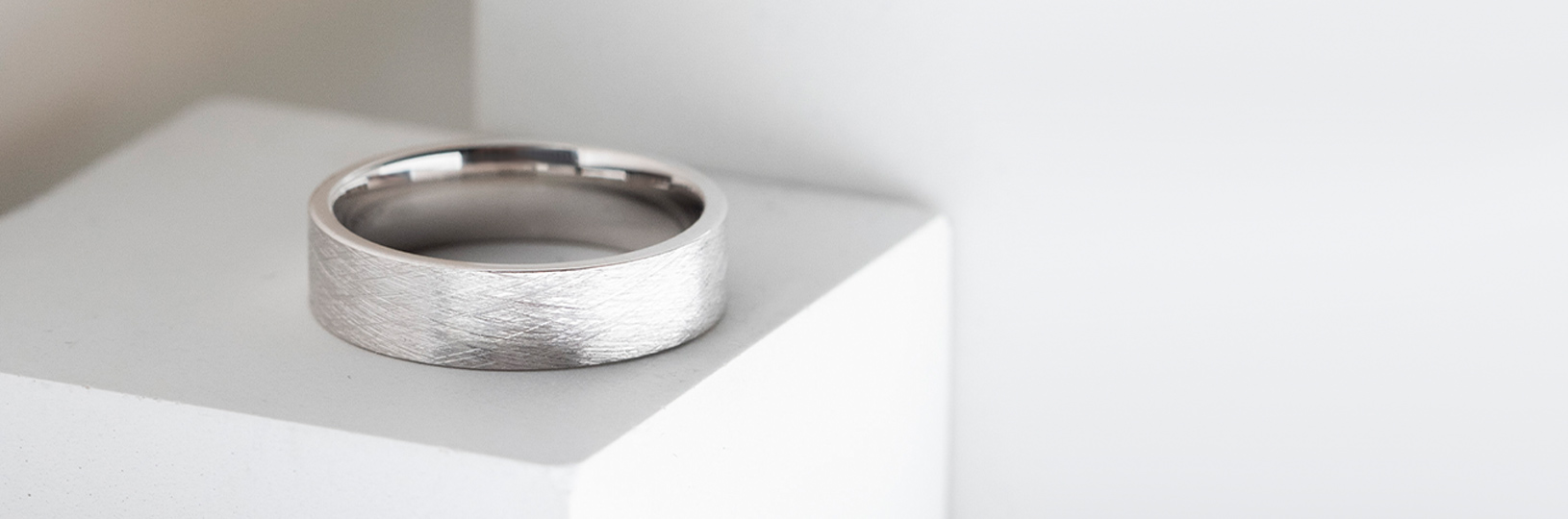 A men's wedding band in titanium