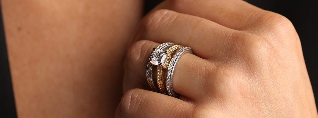 engagement and wedding rings stacked