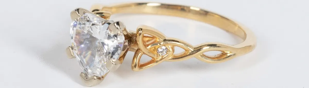 a yellow gold engagement ring