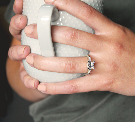 a Diamond Nexus ring on a finger