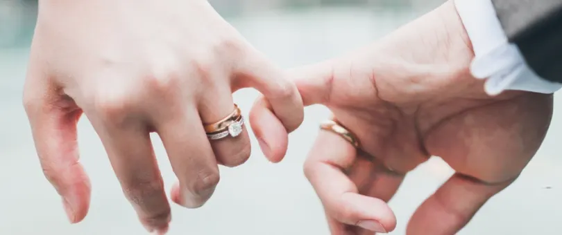 man and woman holding hands